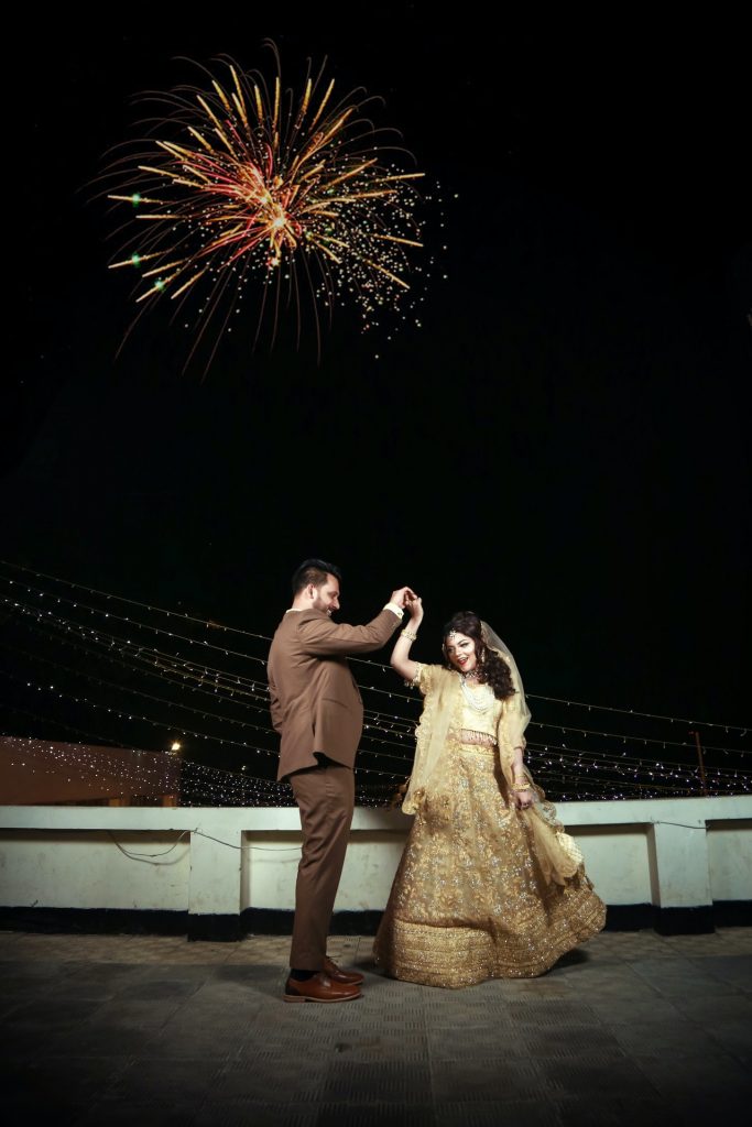 couple dancing confidently at their first dance reception