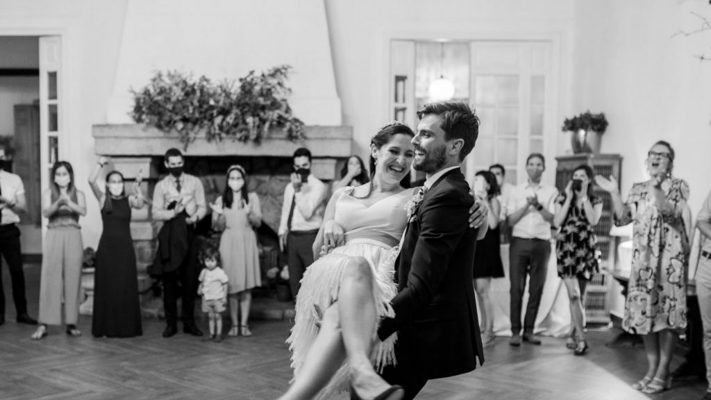 Happy newlyweds dancing together during their wedding first dance