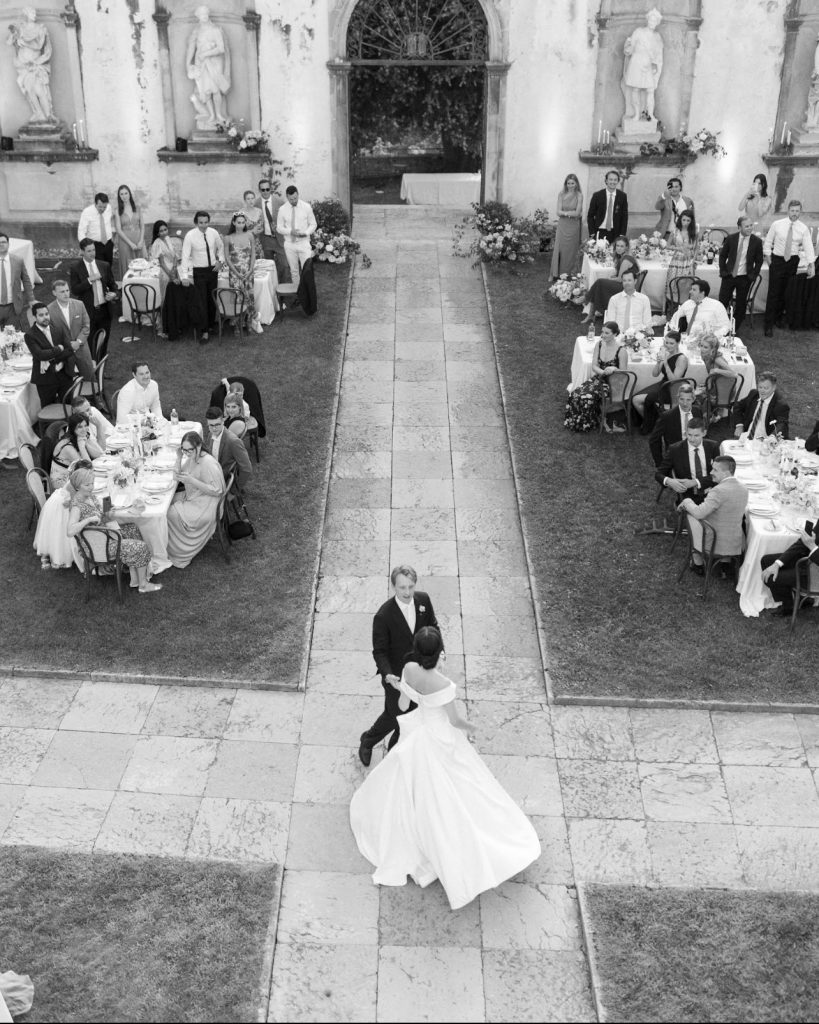 Happy couple dancing together during their wedding first dance