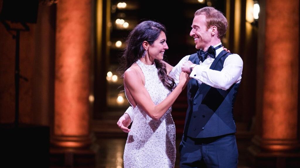 Couple practising a slow romantic first dance during wedding dance lessons in London