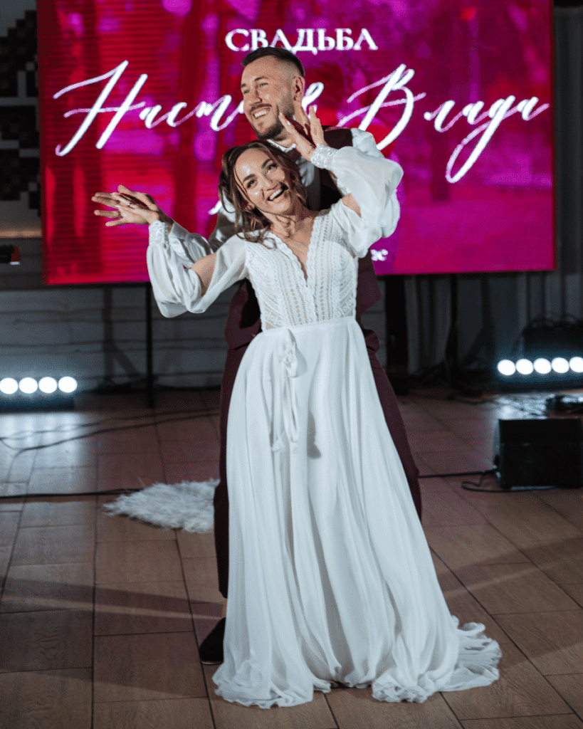 Couple turning gently during their first dance at a wedding reception