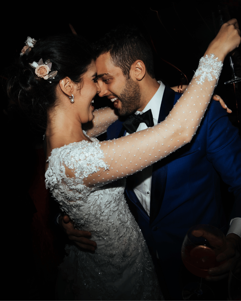 Couple holding each other during their first dance at a wedding