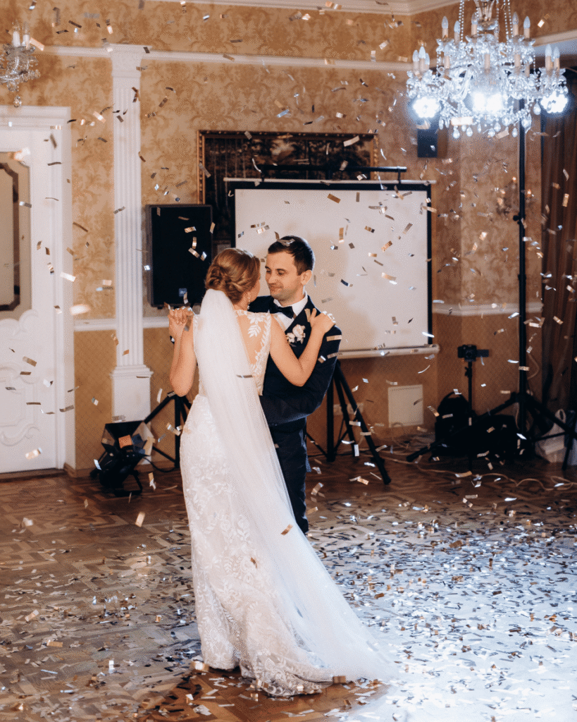Bride and groom smiling during their first dance at a London wedding