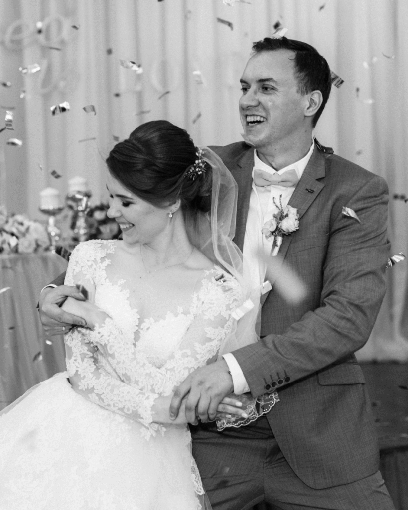 Bride and groom enjoying their first dance on a small wedding dance floor